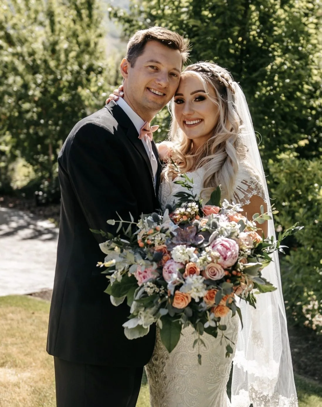 Mariah Smart and her husband on their wedding day