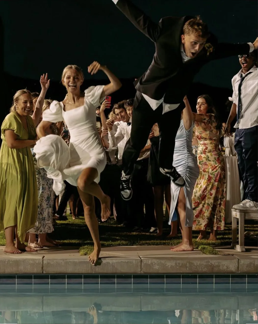 Savannah Bishop celebrating poolside at her wedding